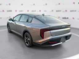 Kia K4 LXS Sedan 2026 — side view