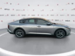Kia K4 LXS Sedan 2026 — side view