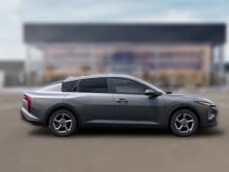 Kia K4 LXS Sedan 2026 — side view