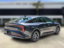 Kia K4 LXS Sedan 2026 — side view