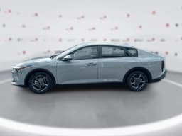 Kia K4 LXS Sedan 2026 — side view