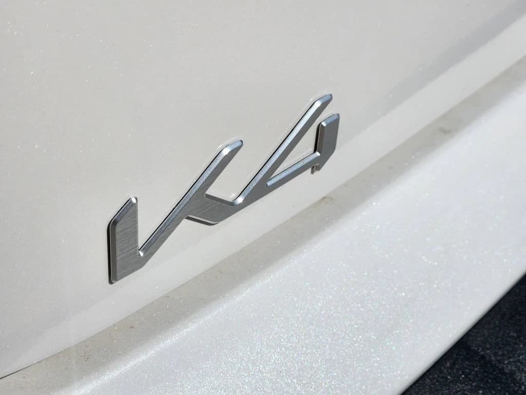 Kia K4 LXS Sedan 2026 — side view