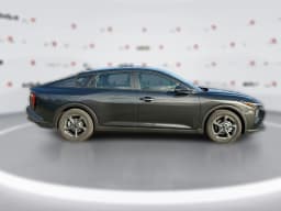 Kia K4 LXS Sedan 2026 — side view