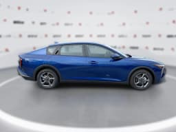 Kia K4 LXS Sedan 2026 — side view