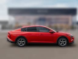 Kia K4 LXS Sedan 2026 — side view