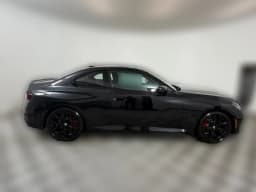 BMW 2 Series 230i xDrive Coupe 2026 — side view