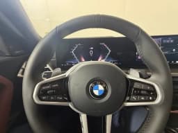BMW 2 Series 230i xDrive Coupe 2026 — side view