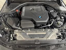 BMW 2 Series 230i xDrive Coupe 2026 — side view