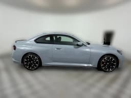 BMW 2 Series 230i xDrive Coupe 2026 — side view