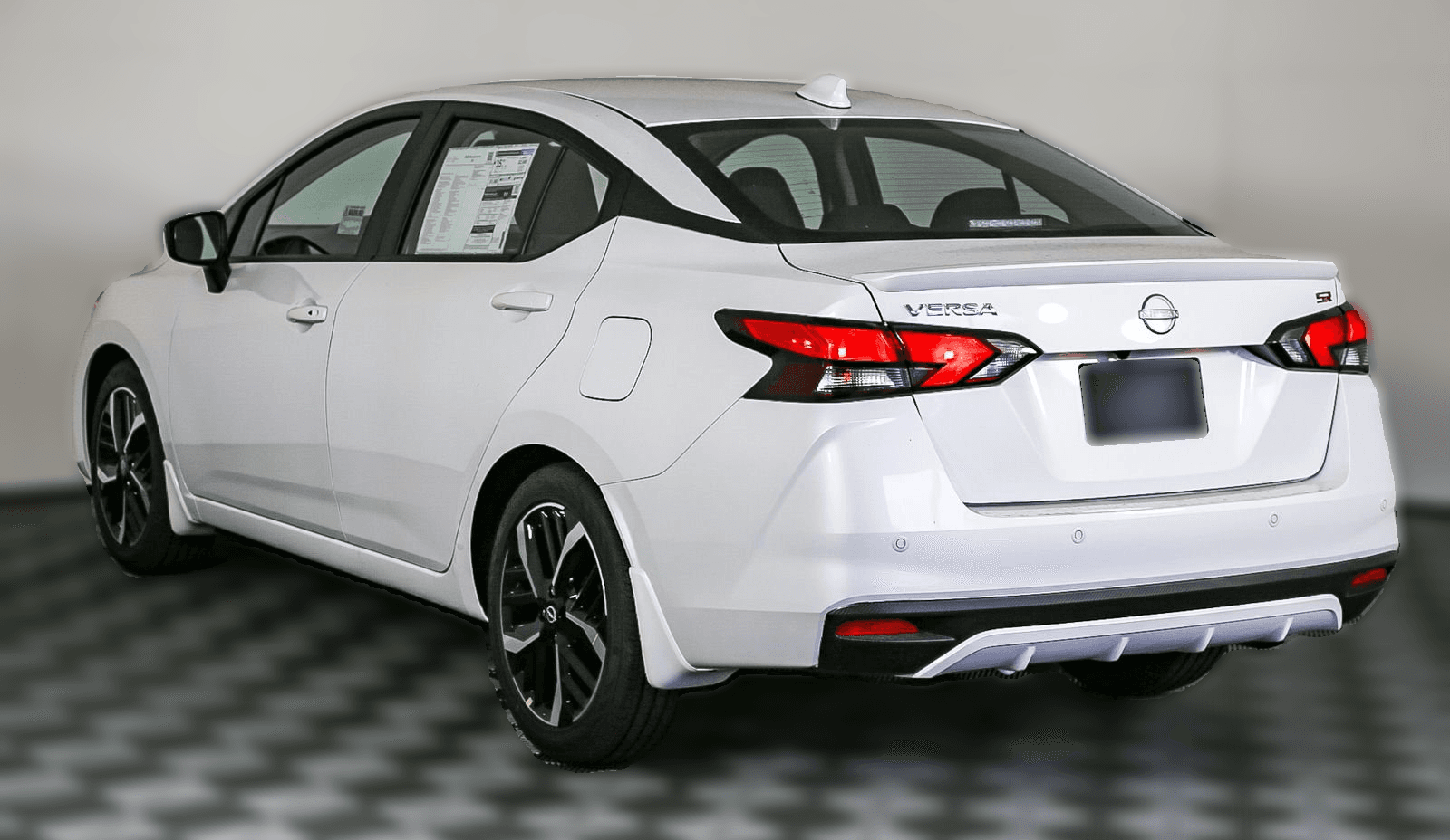 Nissan Versa SR CVT 2025 — side view