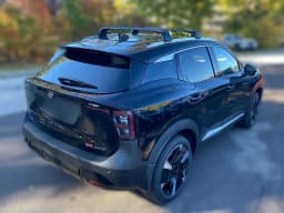 Nissan Kicks SR AWD 2026 — side view