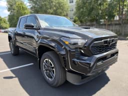 Toyota Tacoma 4WD TRD Sport Double Cab 5' Bed AT (Natl) 2026 — side view
