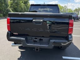 Toyota Tacoma 4WD TRD Sport Double Cab 5' Bed AT (Natl) 2026 — side view
