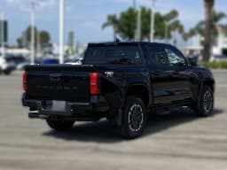 Toyota Tacoma 4WD TRD Sport Double Cab 5' Bed AT (Natl) 2026 — side view