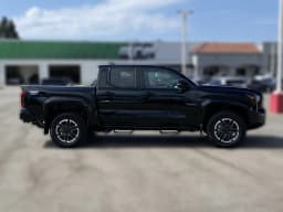 Toyota Tacoma 4WD TRD Sport Double Cab 5' Bed AT (Natl) 2026 — side view