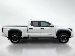 Toyota Tacoma 4WD TRD Off Road Double Cab 6' Bed AT (Natl) 2026 — side view