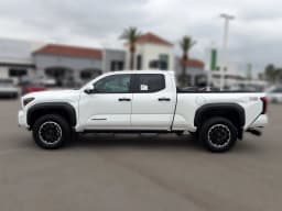 Toyota Tacoma 4WD TRD Off Road Double Cab 6' Bed AT (Natl) 2026 — side view