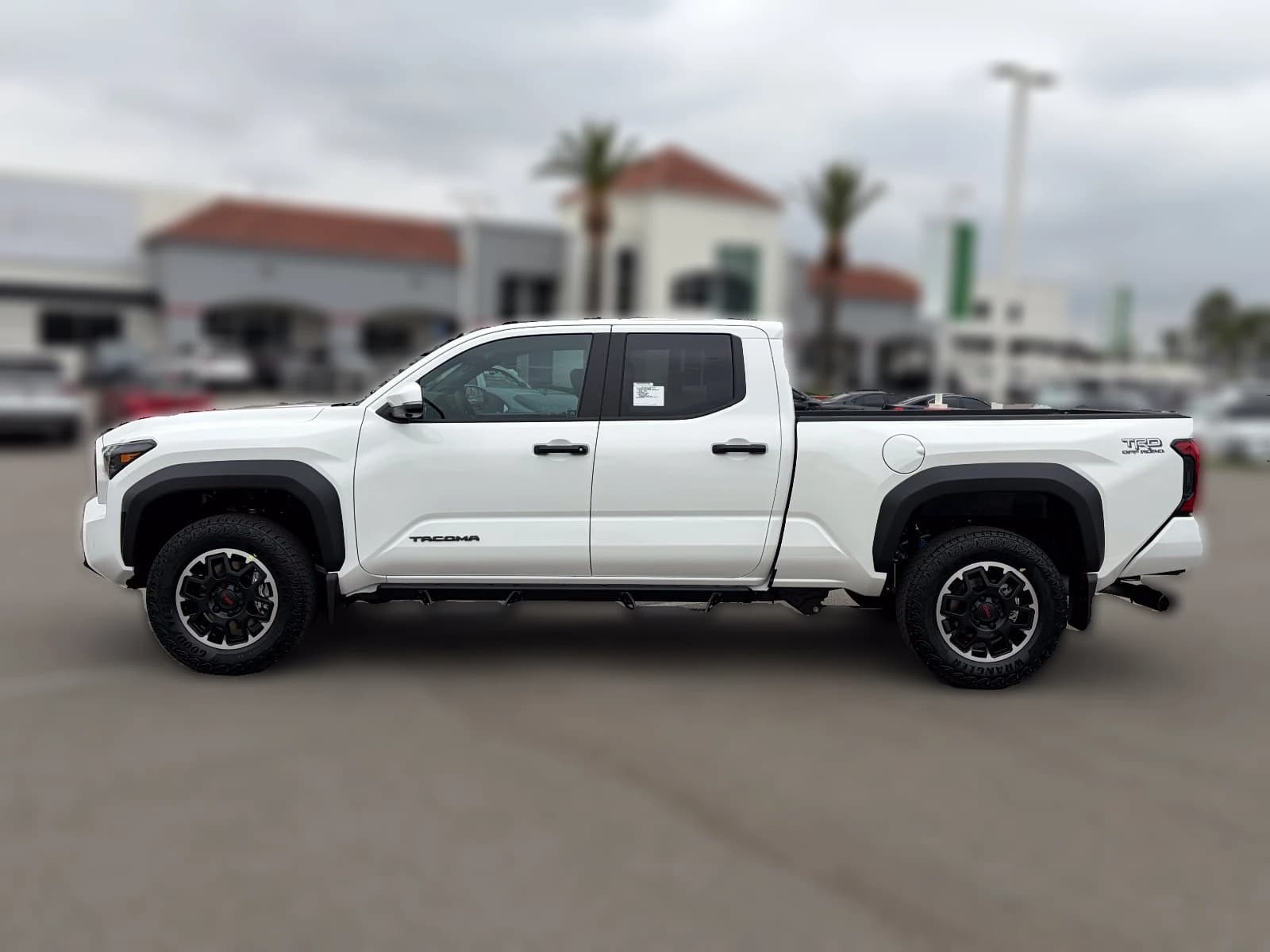 Toyota Tacoma 4WD TRD Off Road Double Cab 6' Bed AT (Natl) 2026 — side view