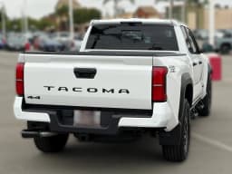 Toyota Tacoma 4WD TRD Off Road Double Cab 6' Bed AT (Natl) 2026 — side view