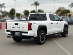 Toyota Tacoma 4WD TRD Off Road Double Cab 6' Bed AT (Natl) 2026 — side view