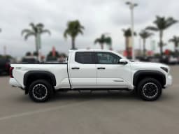 Toyota Tacoma 4WD TRD Off Road Double Cab 6' Bed AT (Natl) 2026 — side view