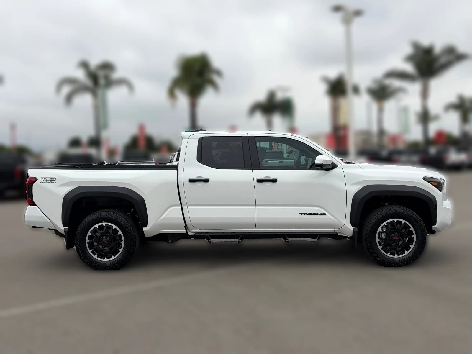 Toyota Tacoma 4WD TRD Off Road Double Cab 6' Bed AT (Natl) 2026 — side view