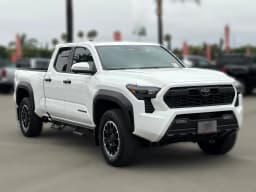 Toyota Tacoma 4WD TRD Off Road Double Cab 6' Bed AT (Natl) 2026 — side view