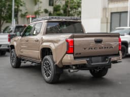 Toyota Tacoma 4WD TRD Sport Double Cab 5' Bed AT (Natl) 2026 — side view