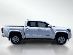Toyota Tacoma 4WD SR5 Double Cab 5' Bed AT (Natl) 2026 — side view