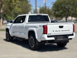 Toyota Tacoma 4WD TRD Sport Double Cab 6' Bed AT (Natl) 2026 — side view