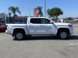 Toyota Tacoma 4WD SR5 Double Cab 5' Bed AT (Natl) 2026 — side view