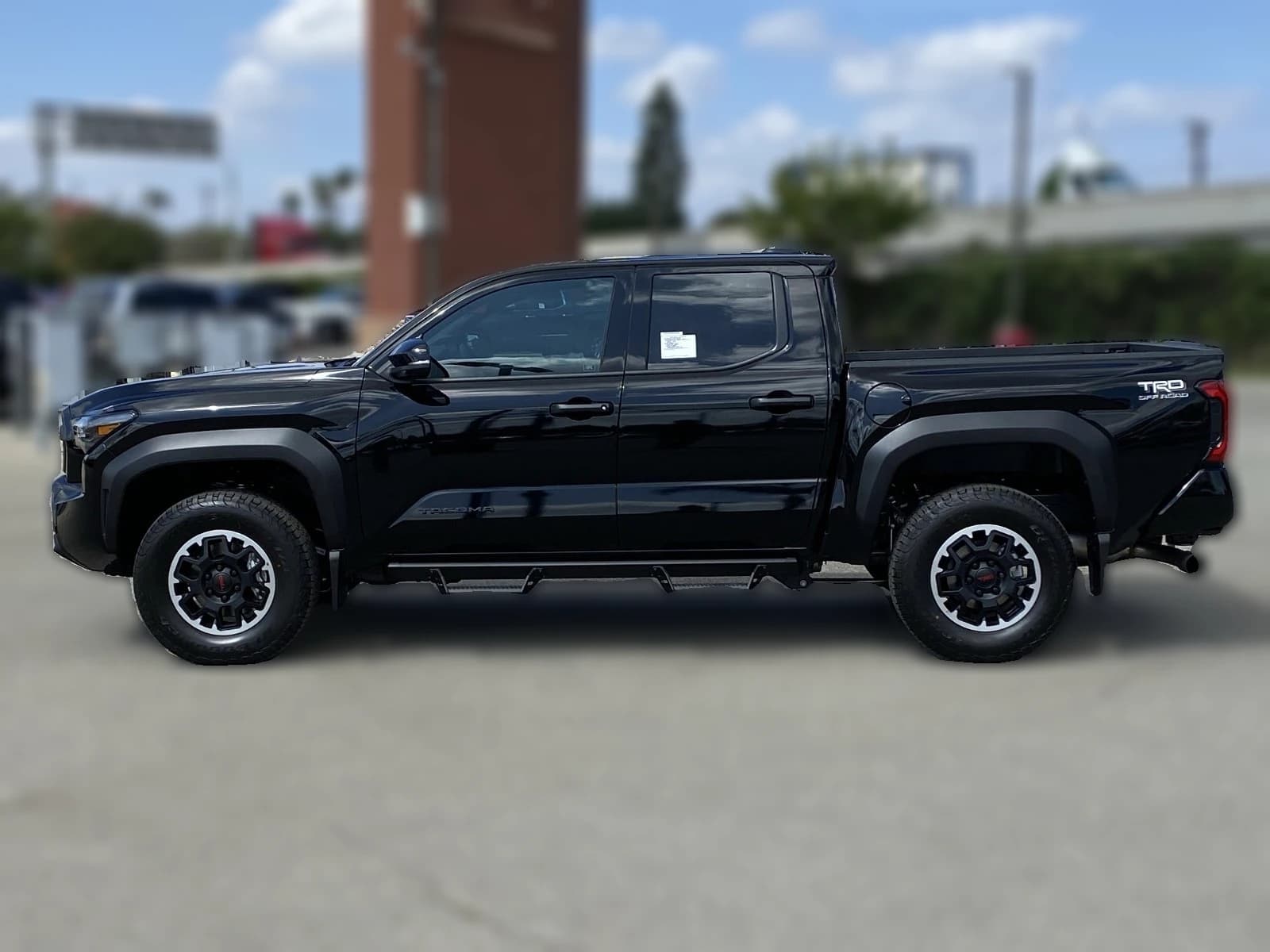 Toyota Tacoma 4WD TRD Off Road Double Cab 6' Bed AT (Natl) 2026 — side view