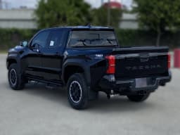 Toyota Tacoma 4WD TRD Off Road Double Cab 6' Bed AT (Natl) 2026 — side view