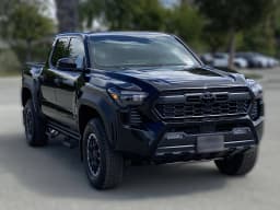 Toyota Tacoma 4WD TRD Off Road Double Cab 6' Bed AT (Natl) 2026 — side view