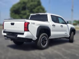 Toyota Tacoma 4WD TRD Off Road Double Cab 5' Bed AT (Natl) 2026 — side view