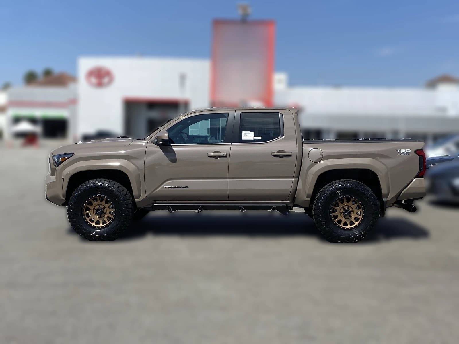 Toyota Tacoma 4WD TRD Sport Double Cab 5' Bed AT (Natl) 2026 — side view