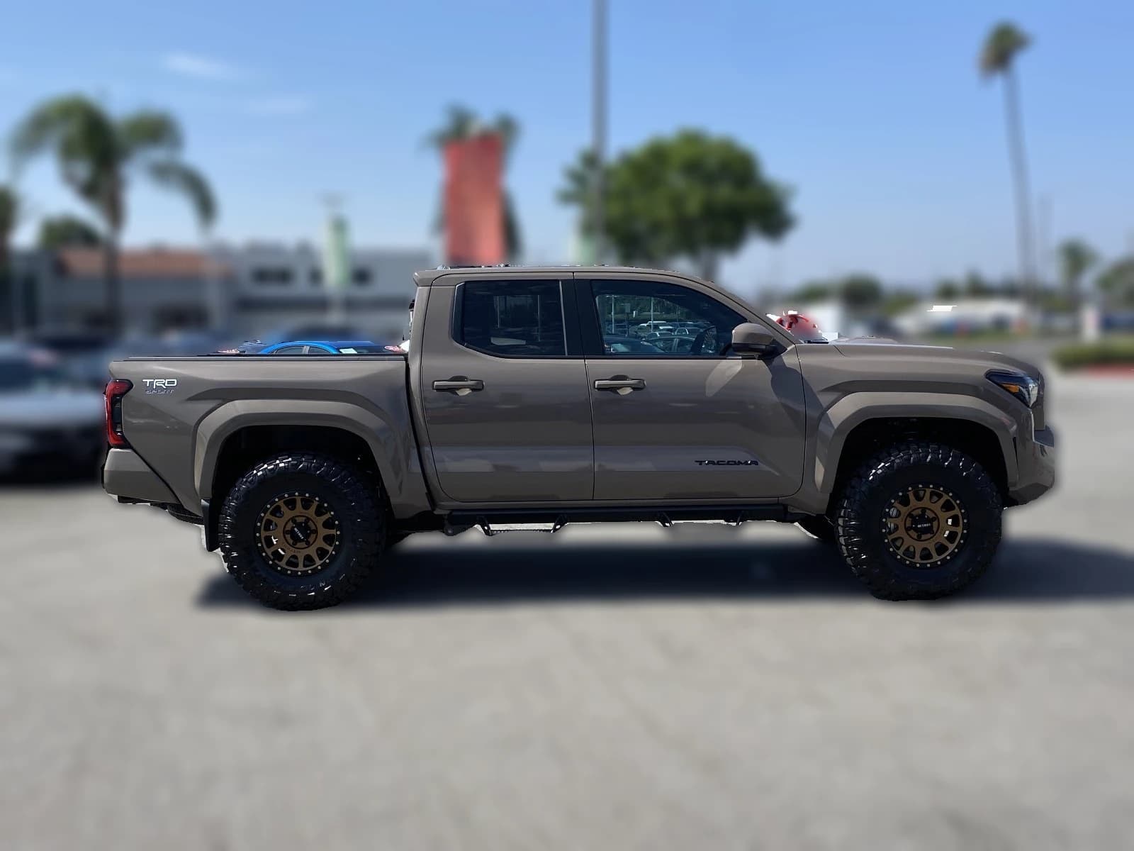 Toyota Tacoma 4WD TRD Sport Double Cab 5' Bed AT (Natl) 2026 — side view