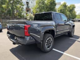 Toyota Tacoma 4WD TRD Sport Double Cab 5' Bed AT (Natl) 2026 — side view