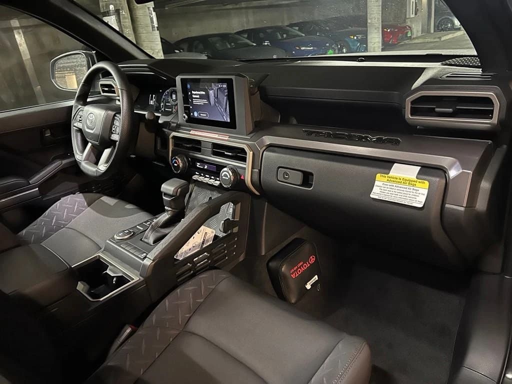 Toyota Tacoma 2WD SR5 XtraCab 6' Bed AT (Natl) 2026 — side view