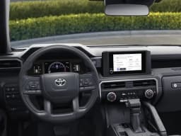 Toyota Tacoma 2WD SR XtraCab 6' Bed AT (Natl) 2026 — side view