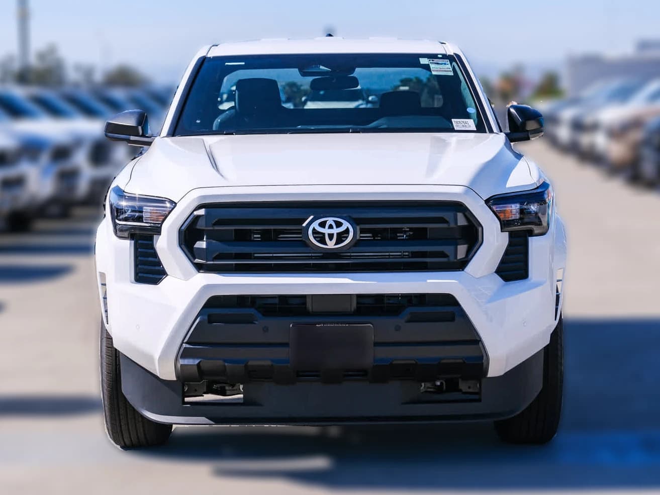 Toyota Tacoma 2WD SR XtraCab 6' Bed AT (Natl) 2026 — side view