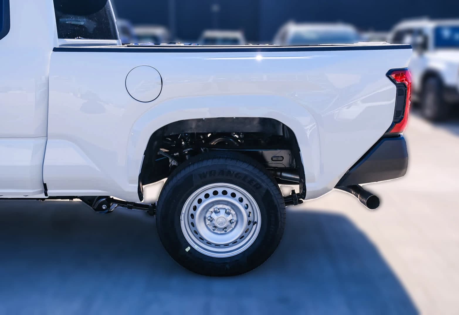 Toyota Tacoma 2WD SR XtraCab 6' Bed AT (Natl) 2026 — side view