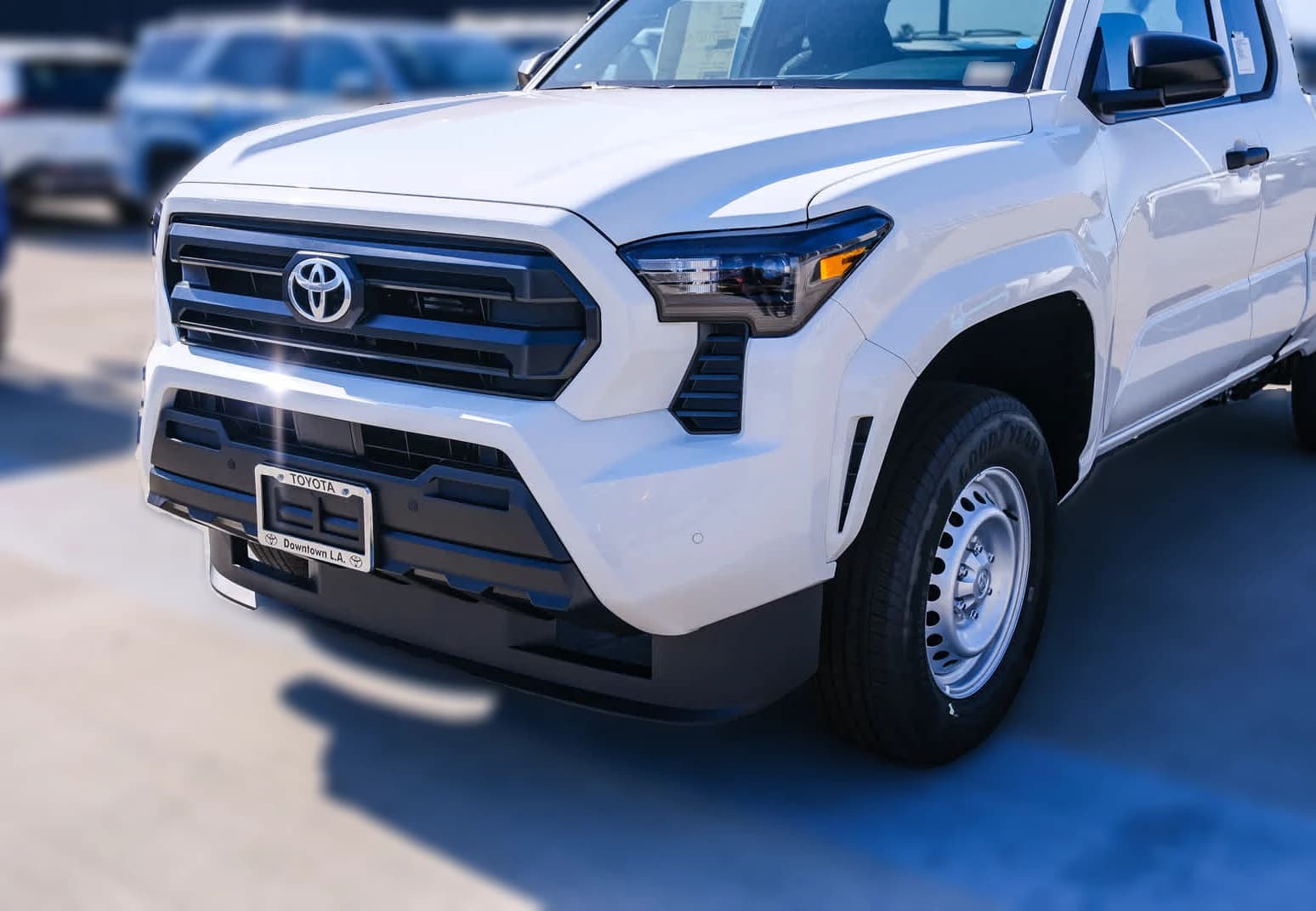 Toyota Tacoma 2WD SR XtraCab 6' Bed AT (Natl) 2026 — side view