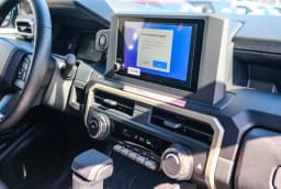 Toyota Tacoma 2WD SR XtraCab 6' Bed AT (Natl) 2026 — side view