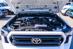 Toyota Tacoma 2WD SR XtraCab 6' Bed AT (Natl) 2026 — side view