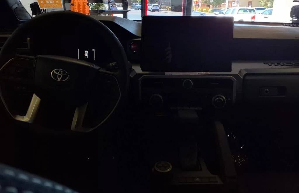 Toyota Tacoma 4WD TRD Off Road Double Cab 5' Bed AT (Natl) 2026 — side view