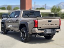 Toyota Tacoma 4WD TRD Off Road Hybrid Double Cab 5' Bed AT (Natl) 2026 — side view