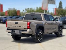 Toyota Tacoma 4WD TRD Off Road Hybrid Double Cab 5' Bed AT (Natl) 2026 — side view