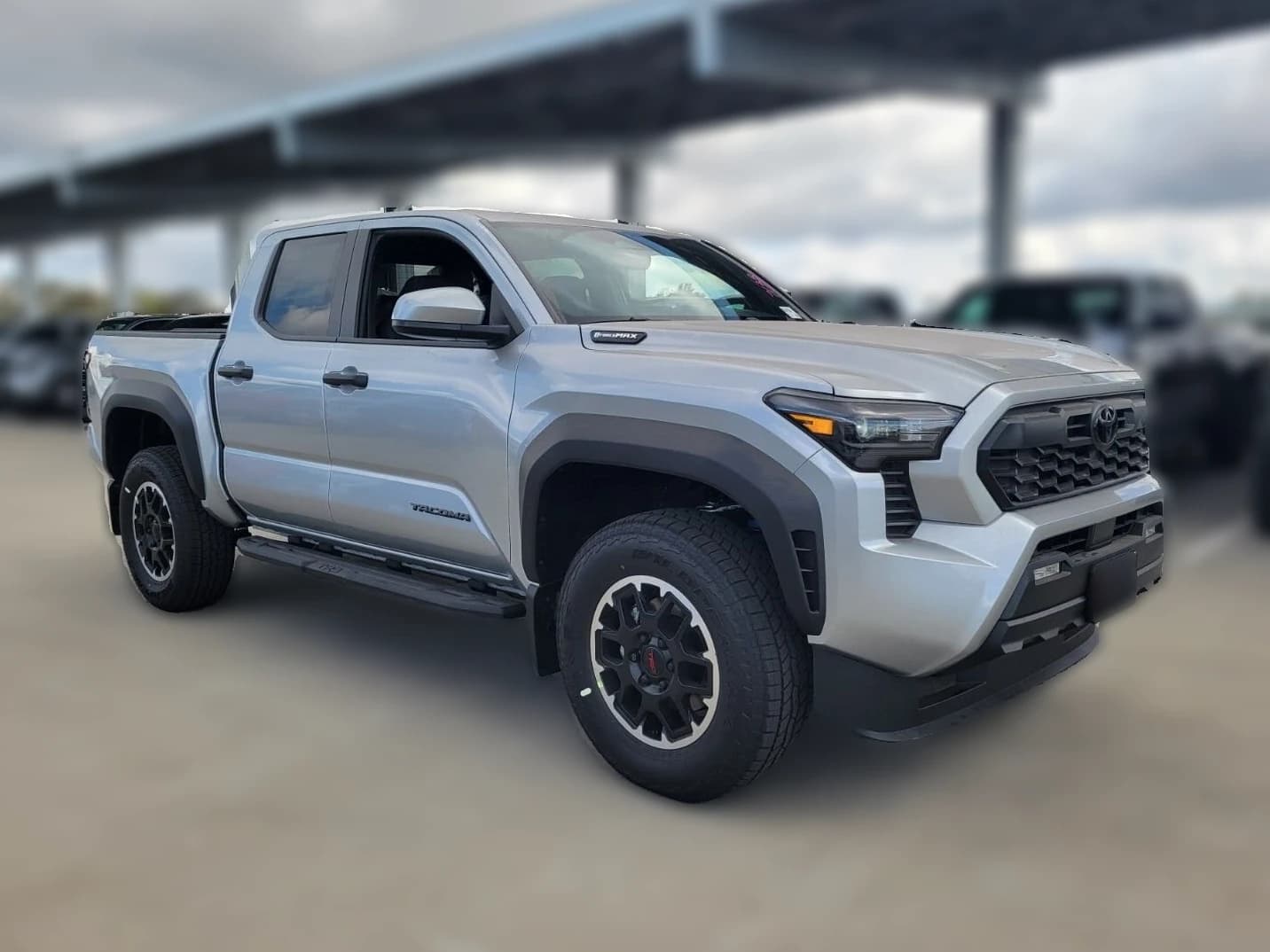 Toyota Tacoma 4WD TRD Off Road Hybrid Double Cab 5' Bed AT (Natl) 2026 — side view