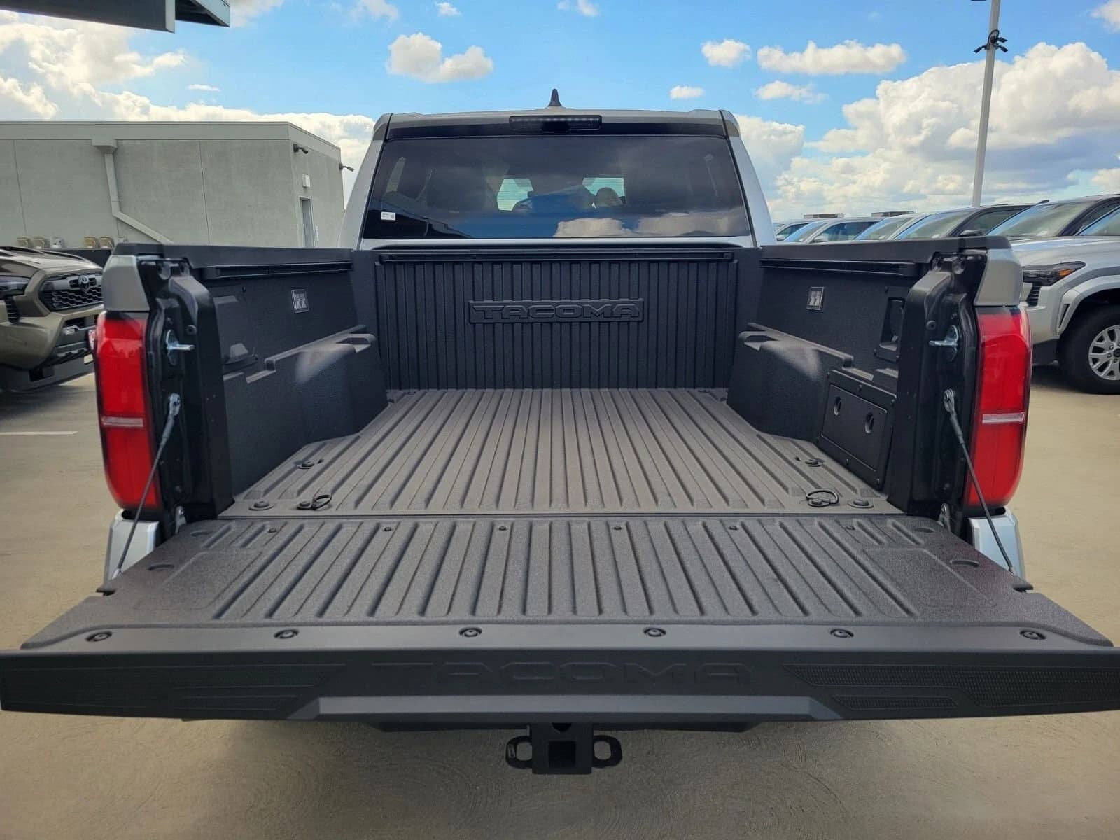 Toyota Tacoma 4WD TRD Off Road Hybrid Double Cab 5' Bed AT (Natl) 2026 — side view